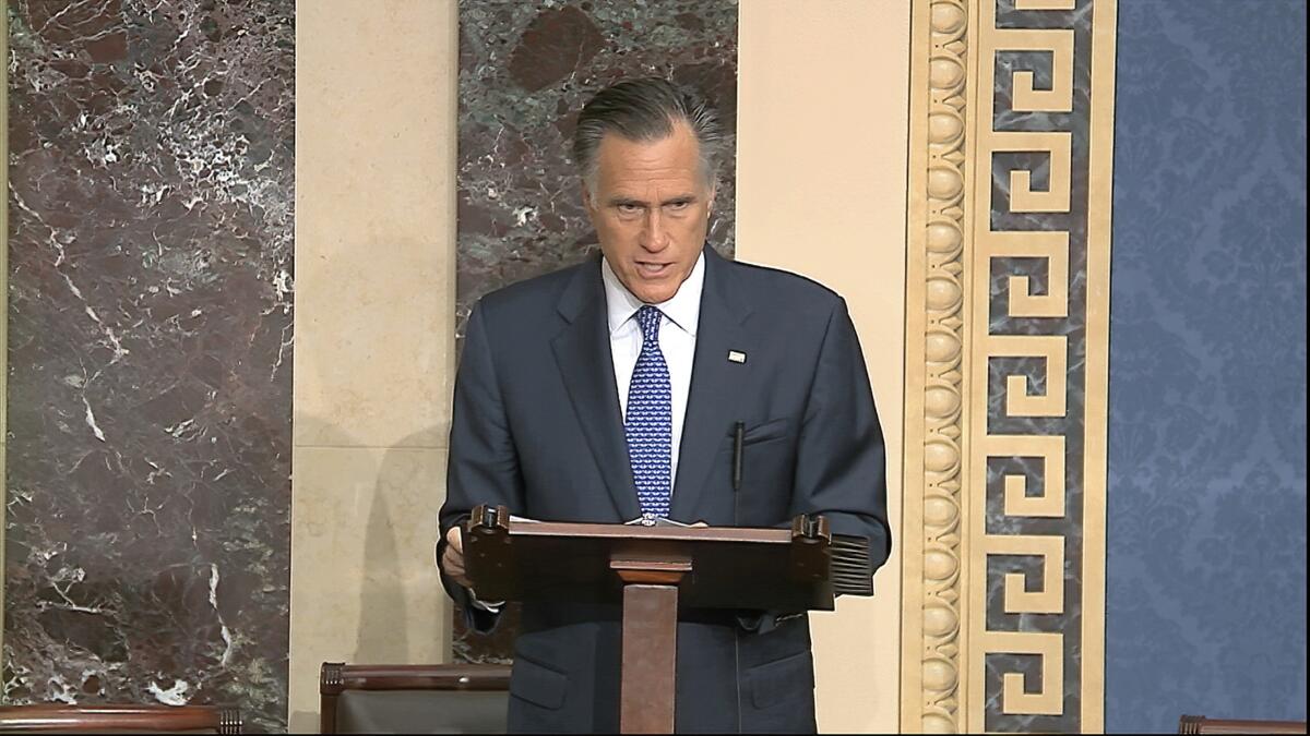 In this image from video, Sen. Mitt Romney (R-Utah) speaks on the Senate floor about the impeachment trial against President Trump at the U.S. Capitol in Washington, D.C., Wednesday. The Senate will vote on the articles of impeachment on Wednesday afternoon.