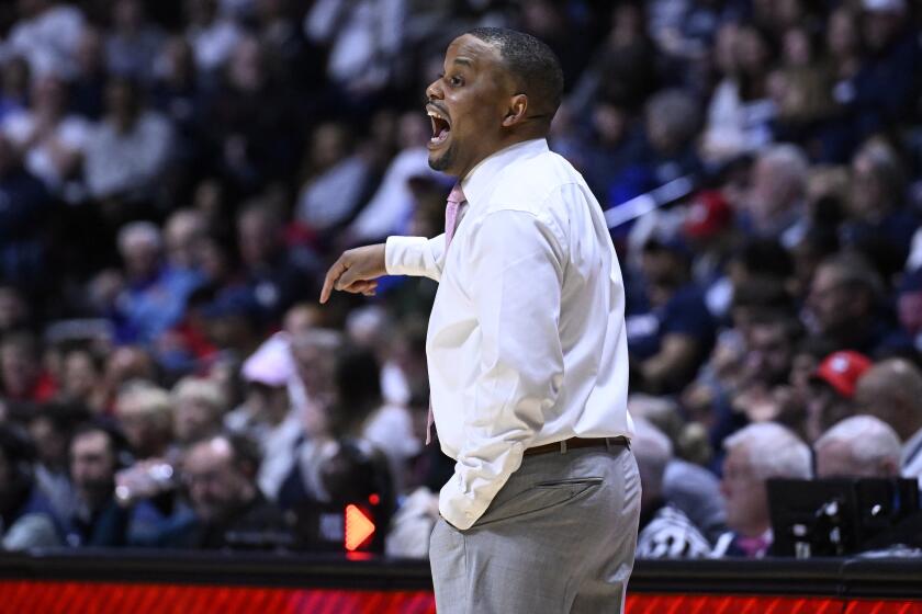 Georgetown interim coach Darnell Haney gestures during the first half of an NCAA college basketball game against UConn in the finals of the Big East Conference tournament at Mohegan Sun Arena, Monday, March 11, 2024, in Uncasville, Conn. (AP Photo/Jessica Hill)