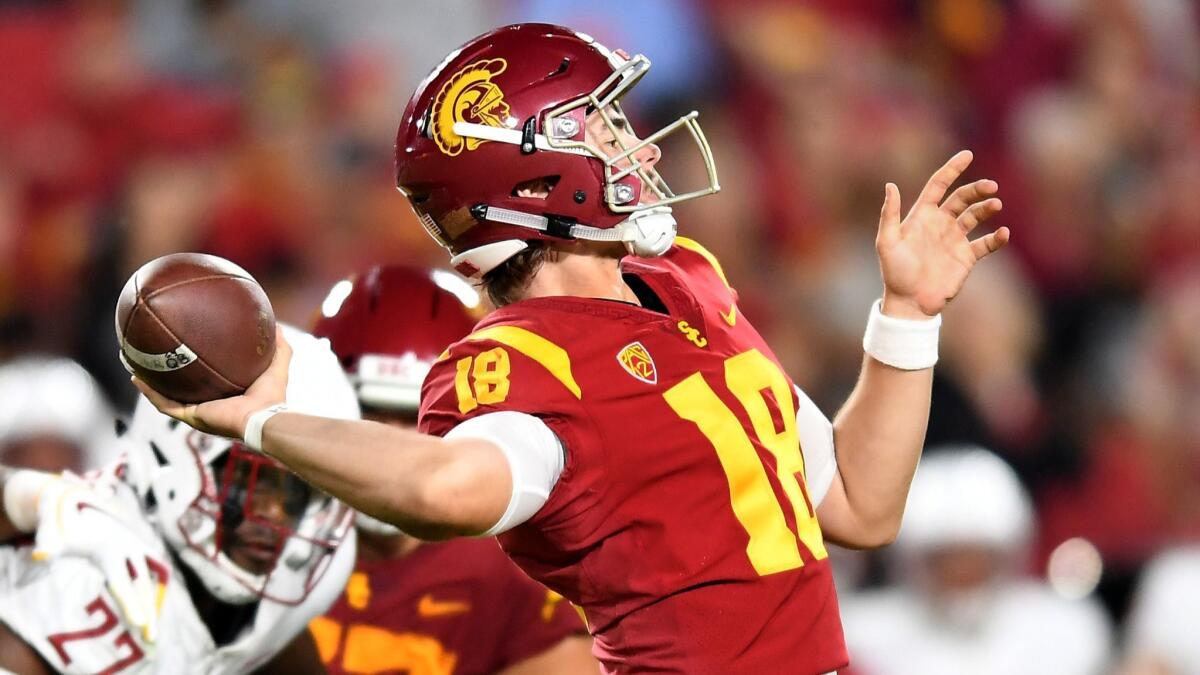 USC quarterback JT Daniels throws a pass against Washington State at the Coliseum on Sept. 21.