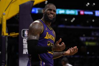 Los Angeles Lakers forward LeBron James (23) reacts after a foul call during the second half.