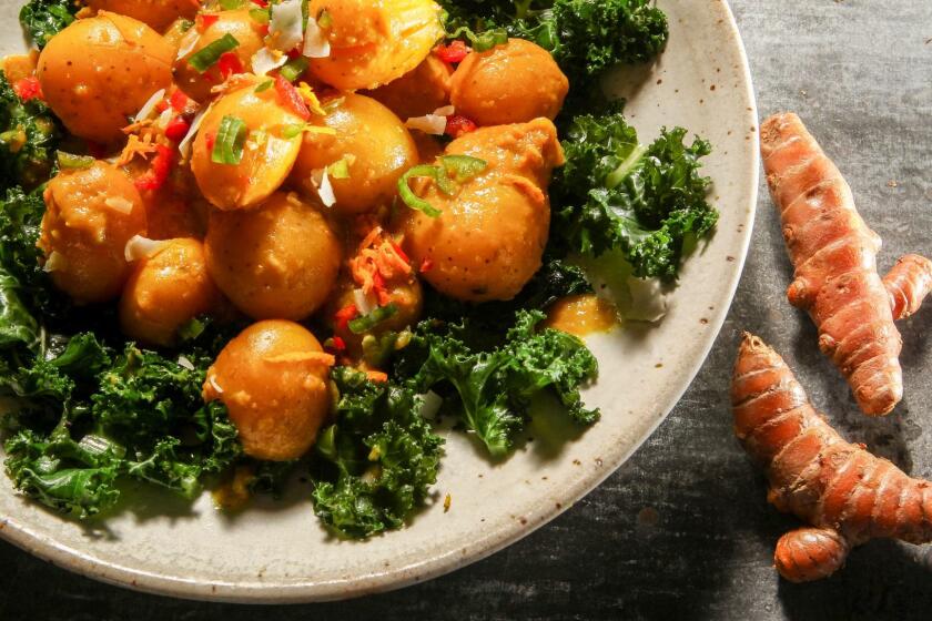 Turmeric-braised baby potatoes with coconut kale.