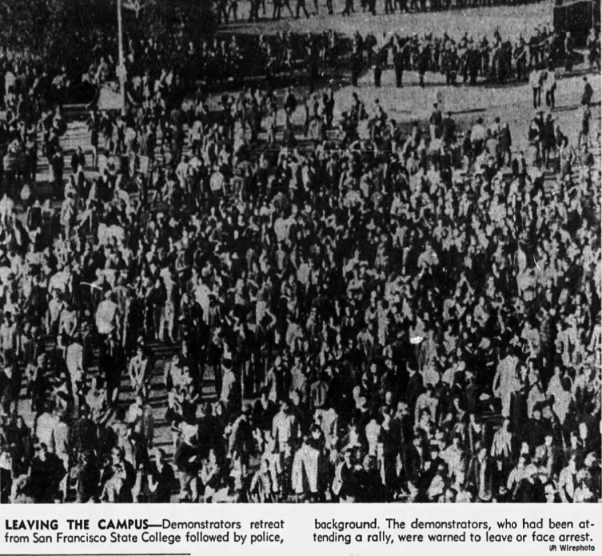 A newspaper clipping of a large crowd of protesters.