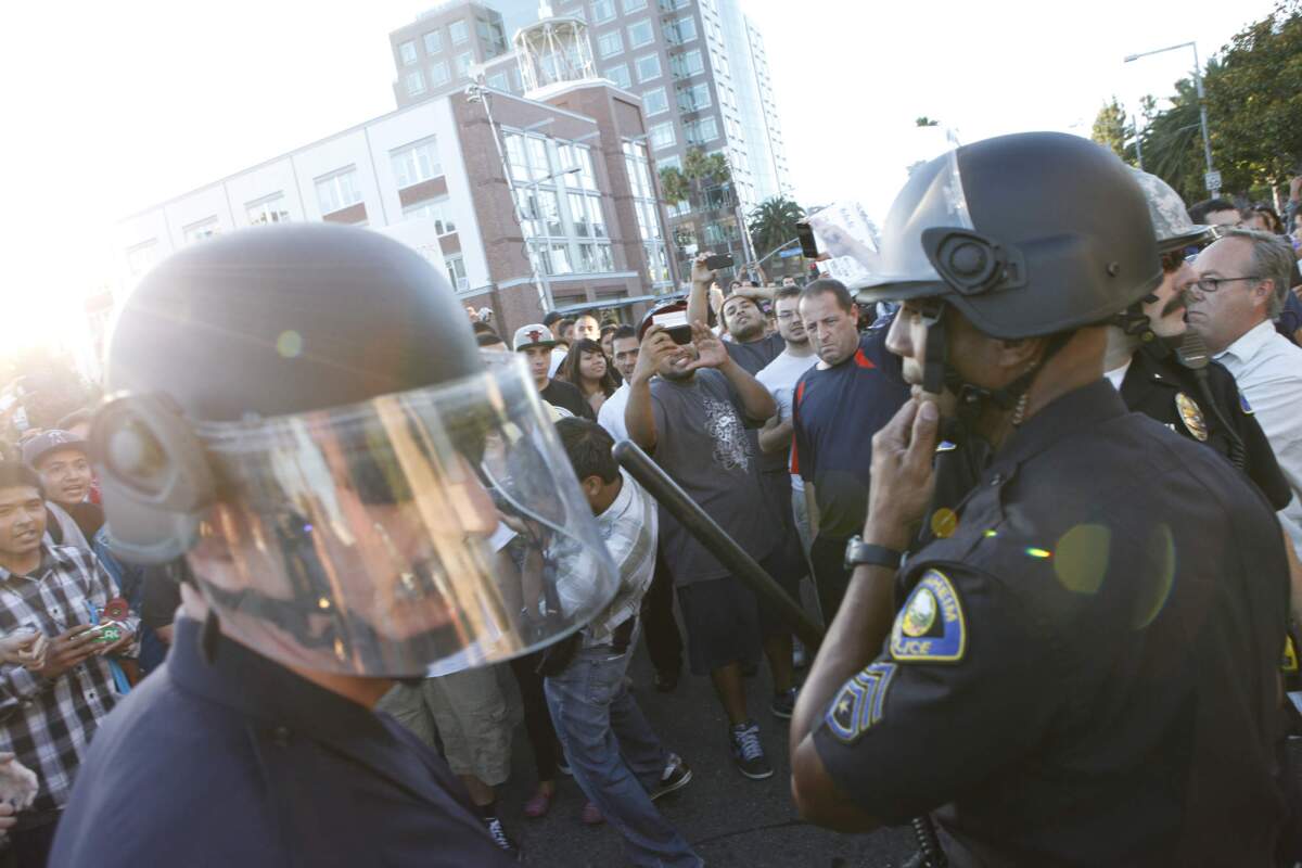 Demonstrators clash with Anaheim police on July 24, 2012.