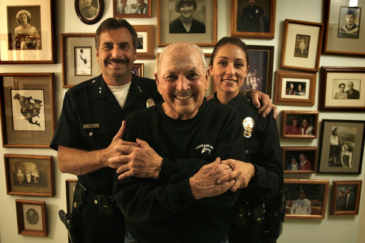 Beck with his father, George, who spent 30 years with the LAPD, and daughter Brandi Scimone, also an LAPD officer.