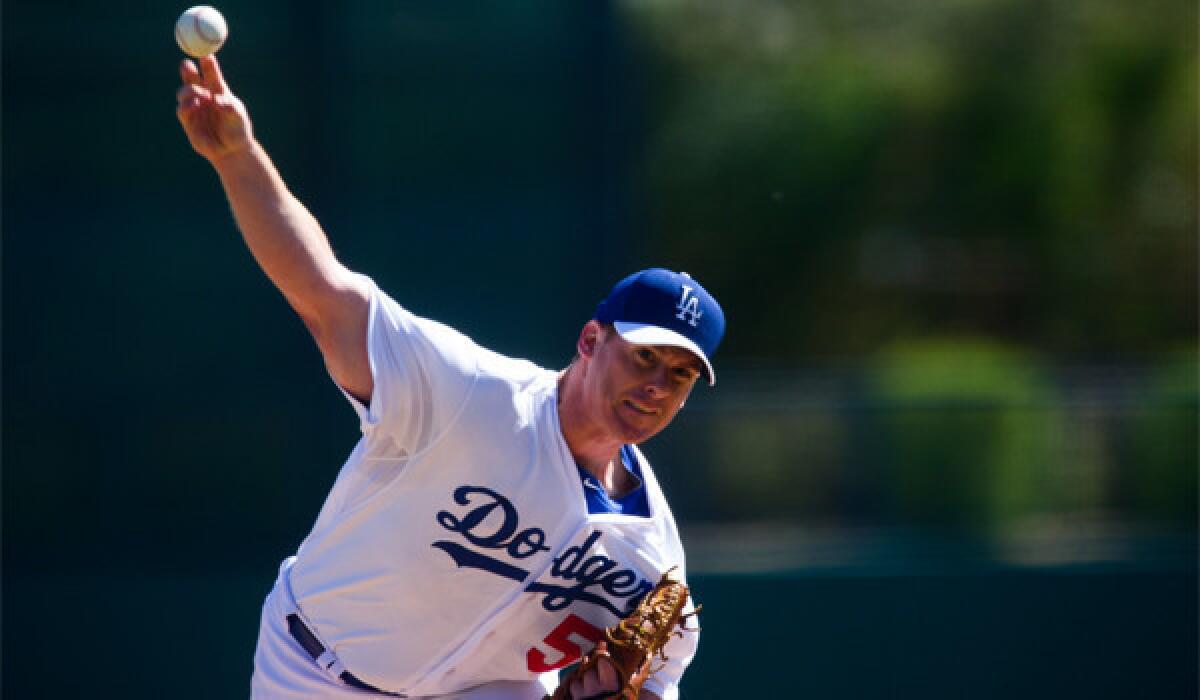 Chad Billingsley, shown pitching for the Dodgers back in February, is one of two L.A. starters expected to start the season on the disabled list.