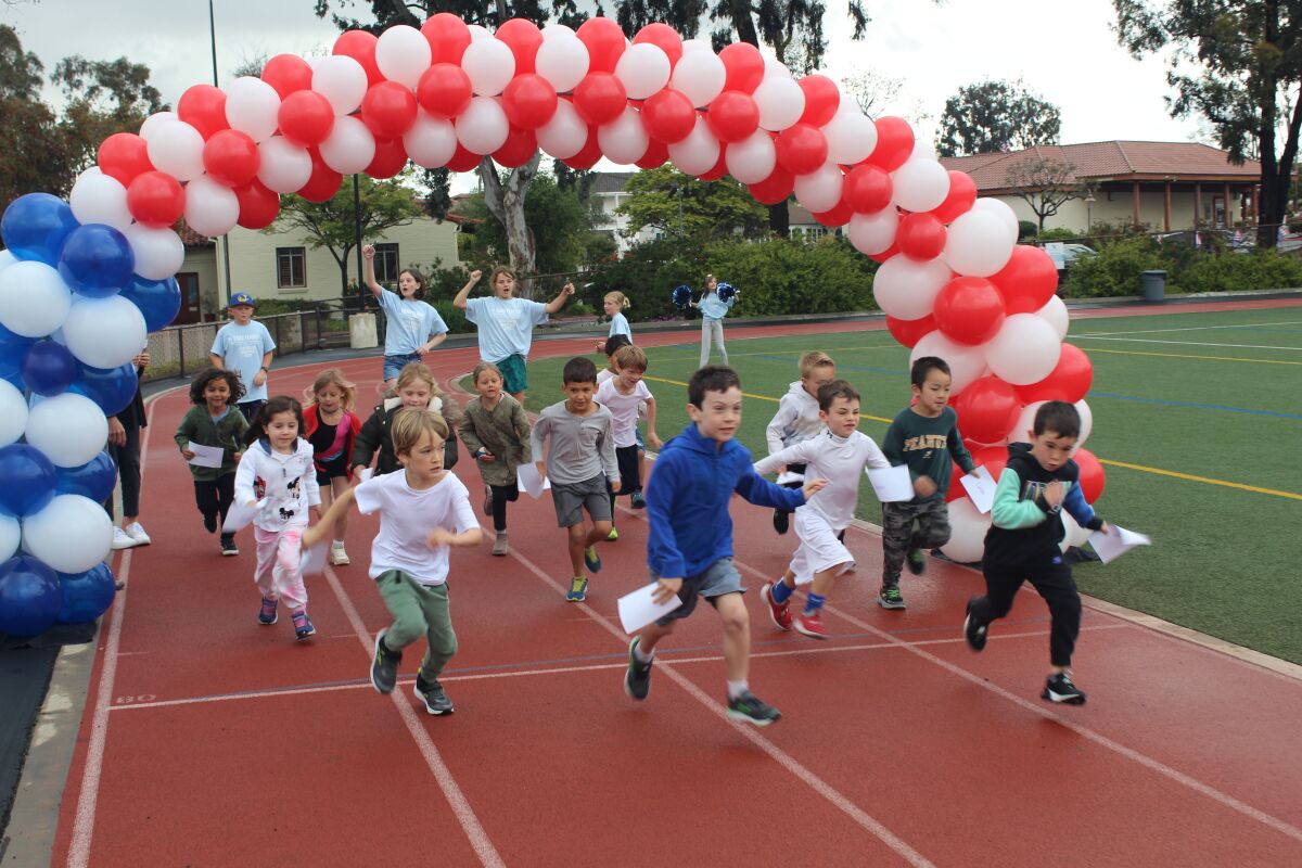 Kindergarten runners take off on the jogathon.