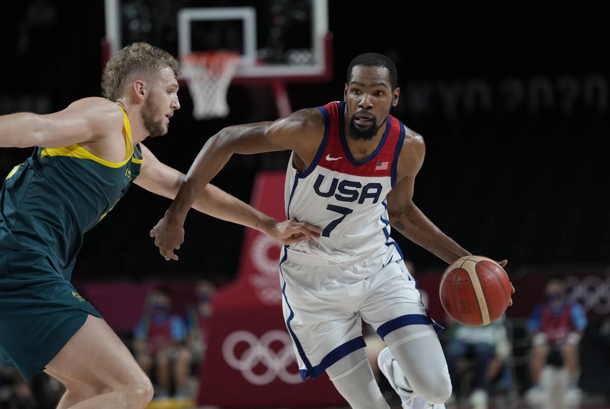 U.S. forward Kevin Durant drives against Australia's Jock Landale during Thursday's game.