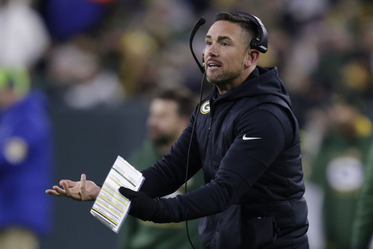 Green Bay Packers head coach Matt LaFleur argues a call during the first half of an NFL football game against the Los Angeles Rams Sunday, Nov. 28, 2021, in Green Bay, Wis. (AP Photo/Matt Ludtke)