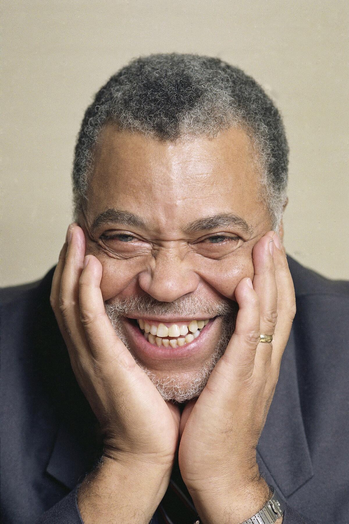 James Earl Jones smiles in a 1990 photo.