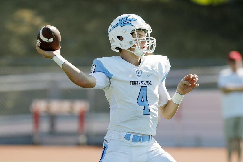 Corona del Mar's Ethan Garbers drops back to pass against Palos Verdes in a non-league football game on Palos Verdes High School on Friday, September 6, 2019.