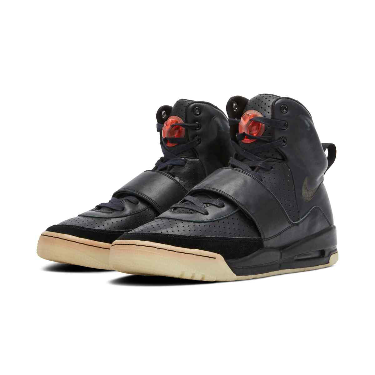 Black Air Yeezy 1 sneakers.