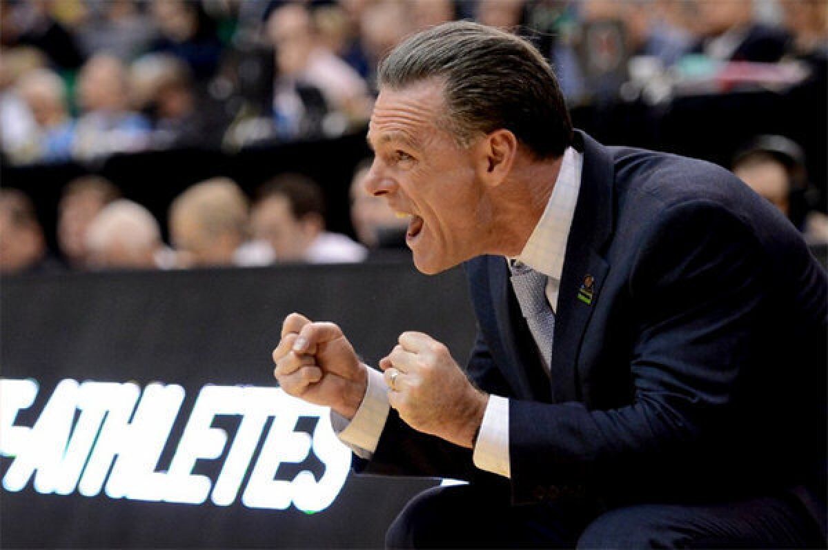 Pittsburgh Coach Jamie Dixon reacts during a game against Wichita State in the second round of the 2013 NCAA Men's Basketball Tournament.