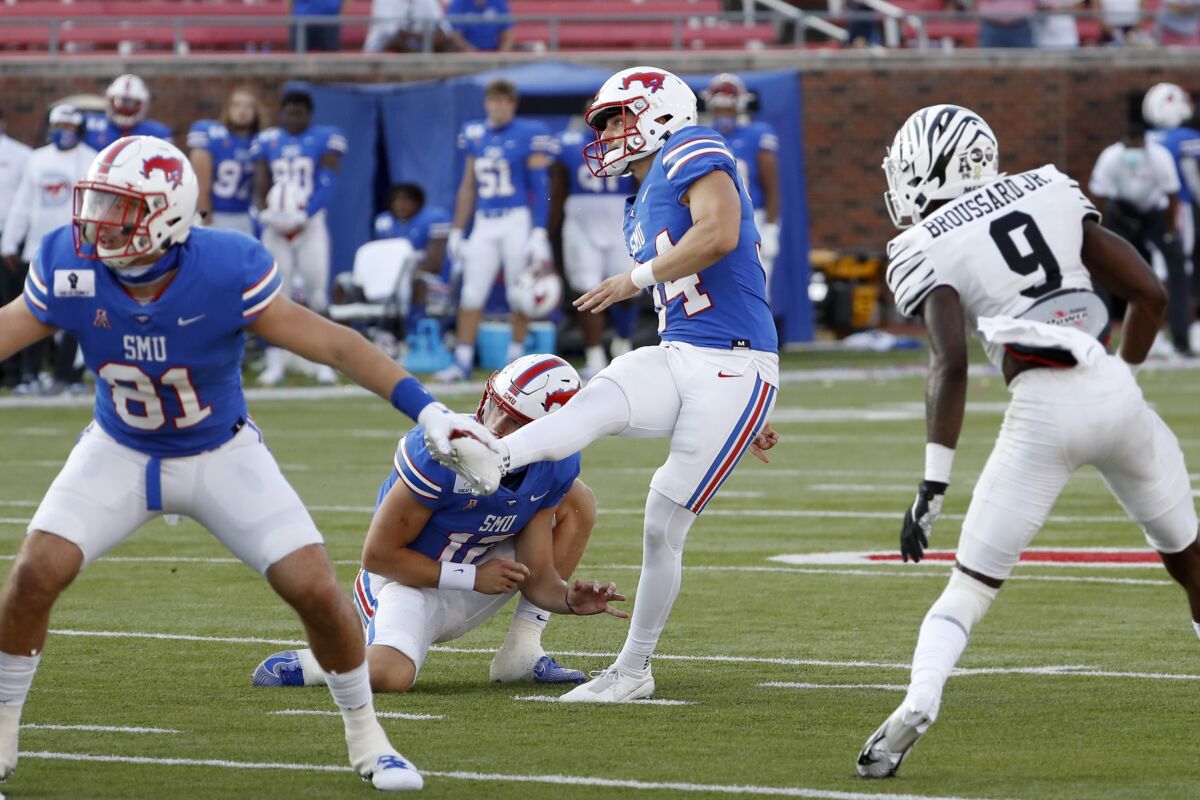 SMU placekicker Chris Naggar (34) boots the the winning field goal with seconds remaining in an NCAA college football game against Memphis in Dallas, Saturday, Oct. 3, 2020. (AP Photo/Roger Steinman)