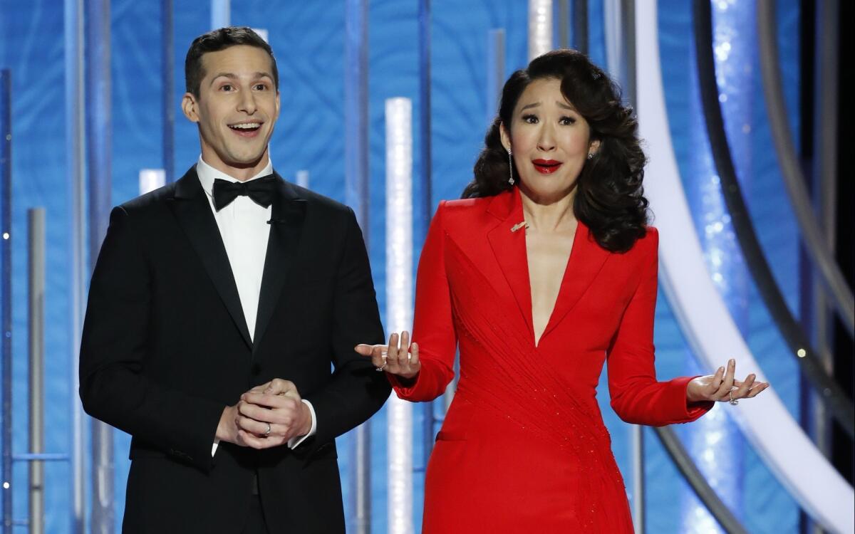 Hosts Andy Samberg and Sandra Oh at the beginning of Sunday's show.