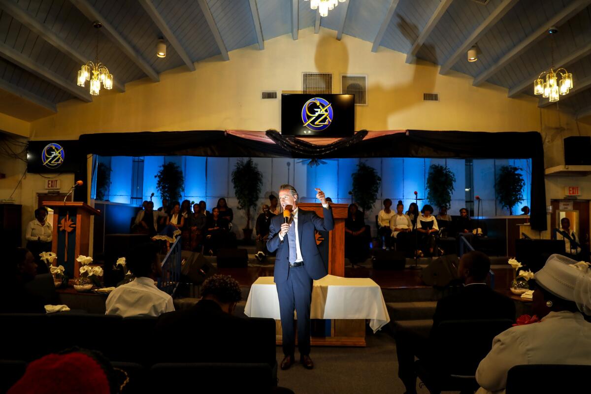 Lt. Gov. Gavin Newsom campaigns at Greater Zion Church Family church in Compton on Sunday.