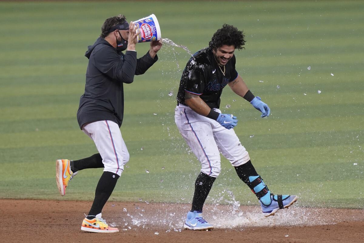 Alfaro helps Marlins rally in 9th, 10th to beat Giants 7-6 - The