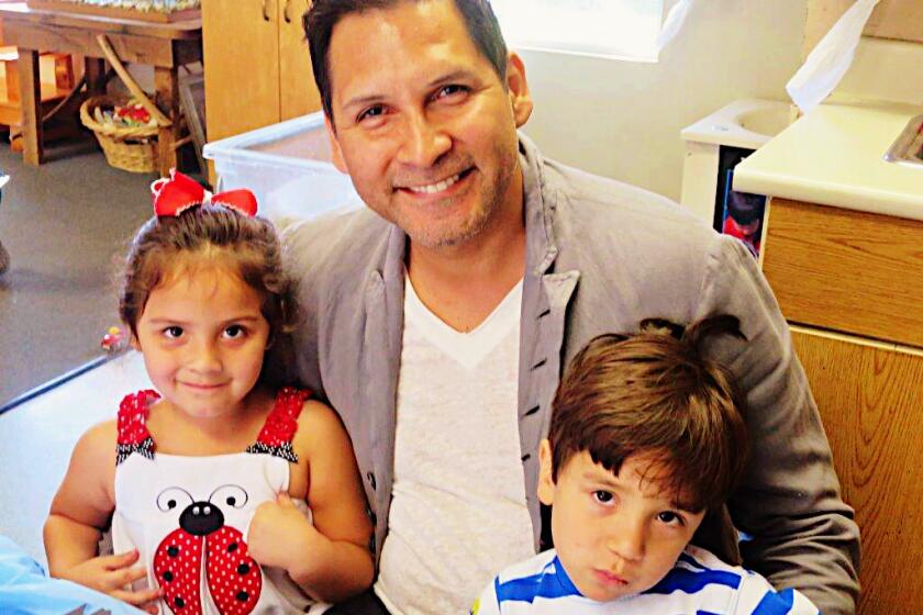 Pictured above, Renzzo Reyes with his two twin children, Bailey and Bryce. Reyes drove from Tijuana to Newport Beach every day to teach his students until he was in an accident in October.