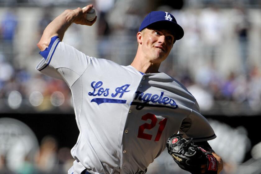 Dodgers starter Zack Greinke pitches during the first inning against the San Diego Padres at Petco Park on Saturday.