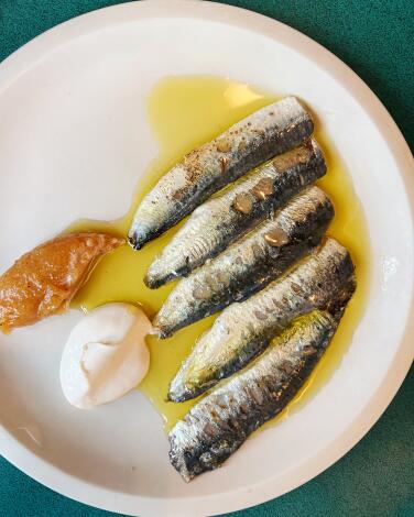 Sardines with smoked crème fraîche and lemon curd at Clamato in Paris.
