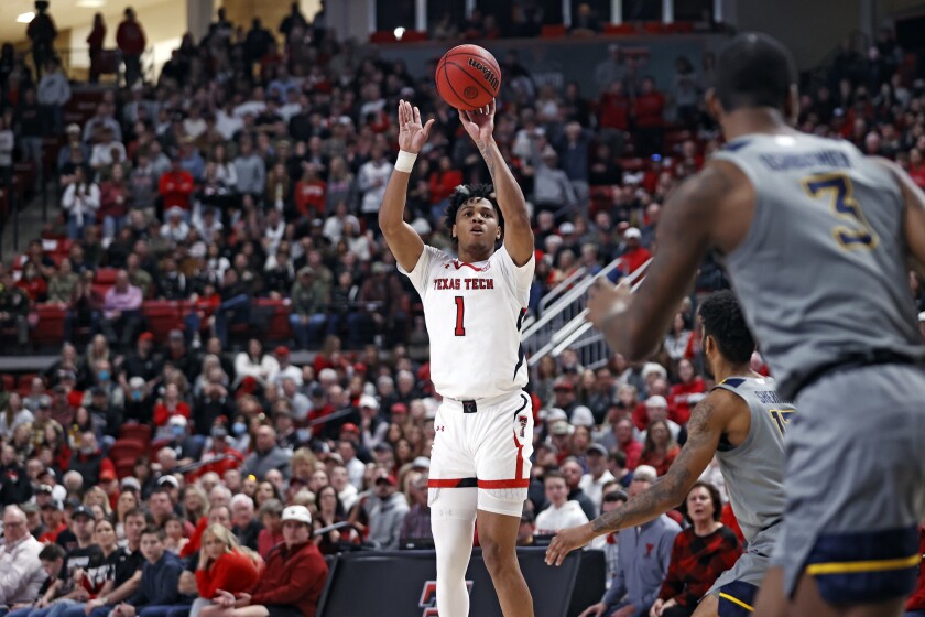 Texas Tech's Terrence Shannon Jr. (1) shoots the ball during the second half of an NCAA college basketball game against West Virginia, Saturday, Jan. 22, 2022, in Lubbock, Texas. (AP Photo/Brad Tollefson)