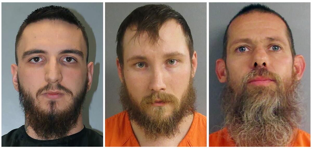 Booking photos of three men