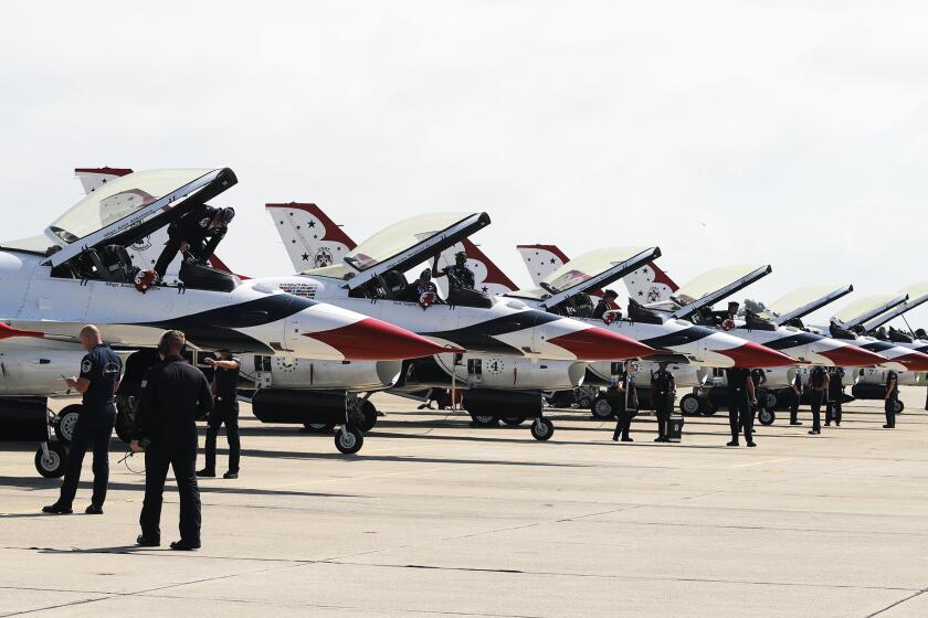 The Air Force Thunderbirds pilots step into their aircraft for a test flight during the Pacific Air Show preview event at the Joint Forces Training Base Los Alamitos in Los Alamitos on Thursday, September 28, 2023. (Photo by James Carbone)
