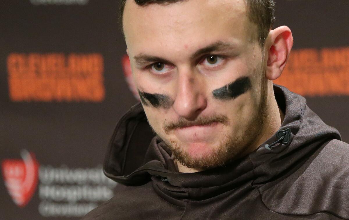 Quarterback Johnny Manziel speaks with media members after a Cleveland Browns game against Seattle on Dec. 20.