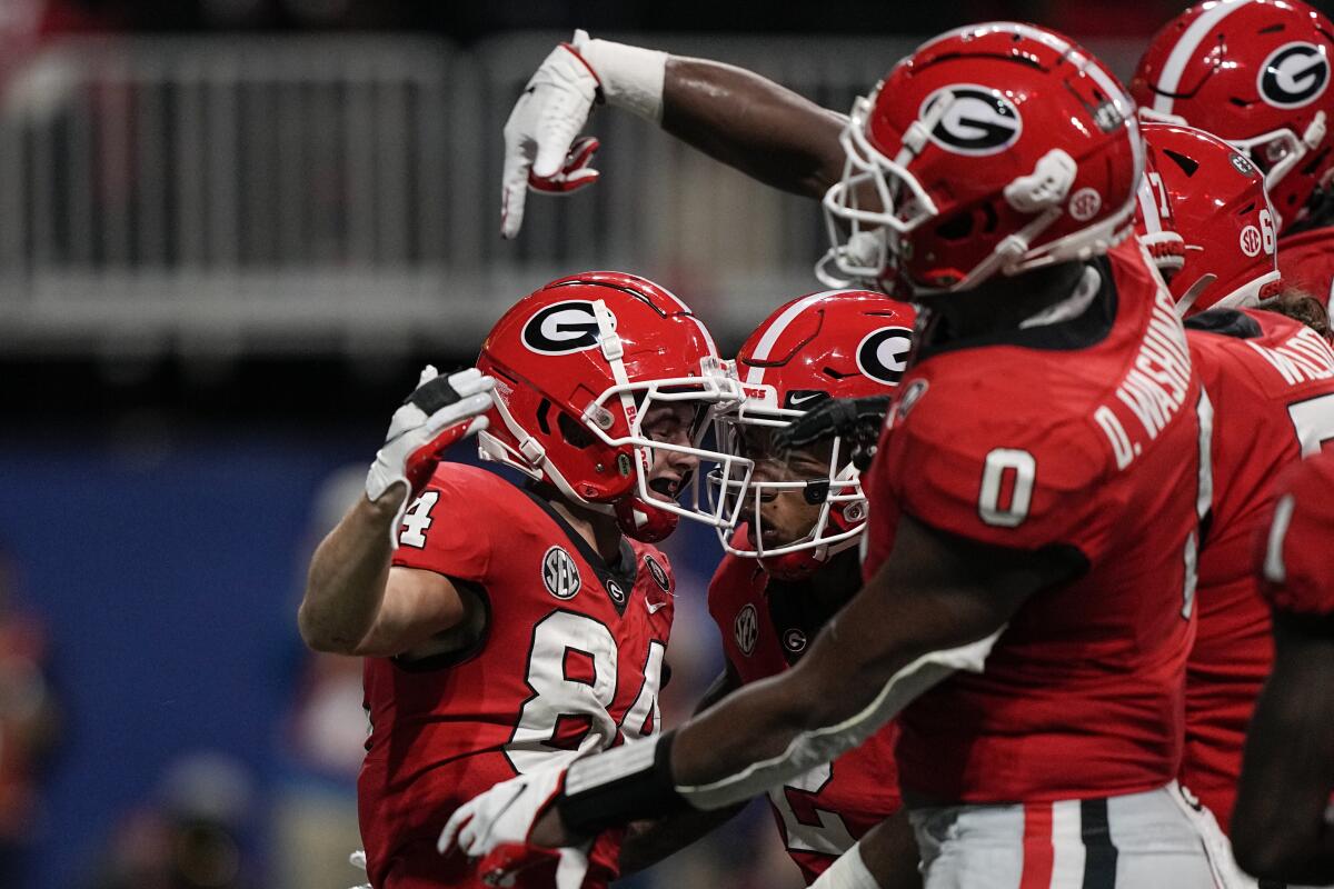 Georgia wide receiver Ladd McConkey celebrates a touchdown with his teammates.