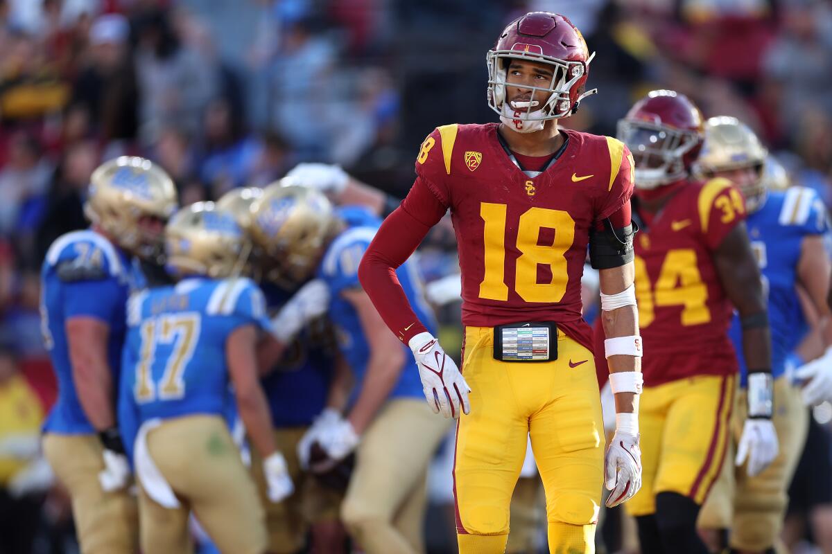 USC linebacker Eric Gentry stands on the field during a loss to UCLA at the Coliseum in November.