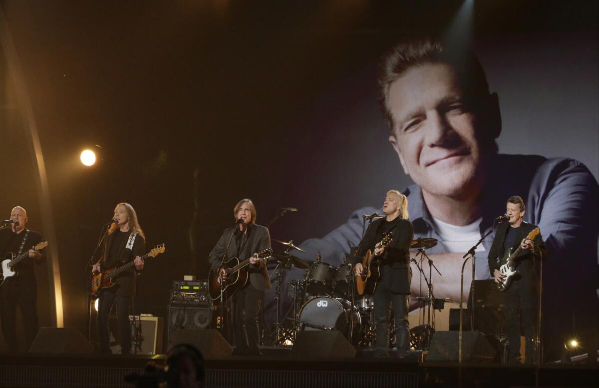 The Eagles and Jackson Browne pay tribute to the late Glenn Frey during the 58th Grammy Awards in Los Angeles.
