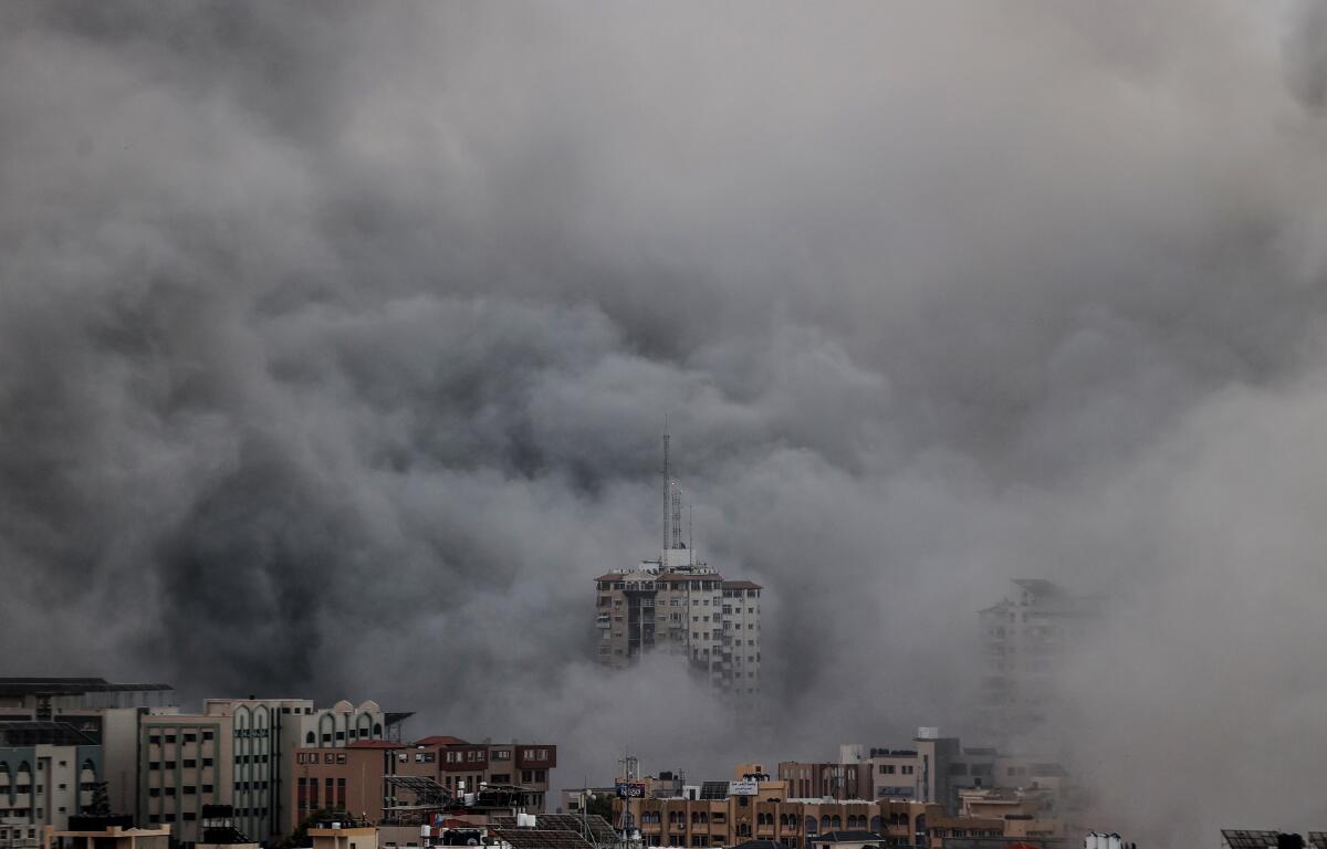 Heavy smoke above buildings.