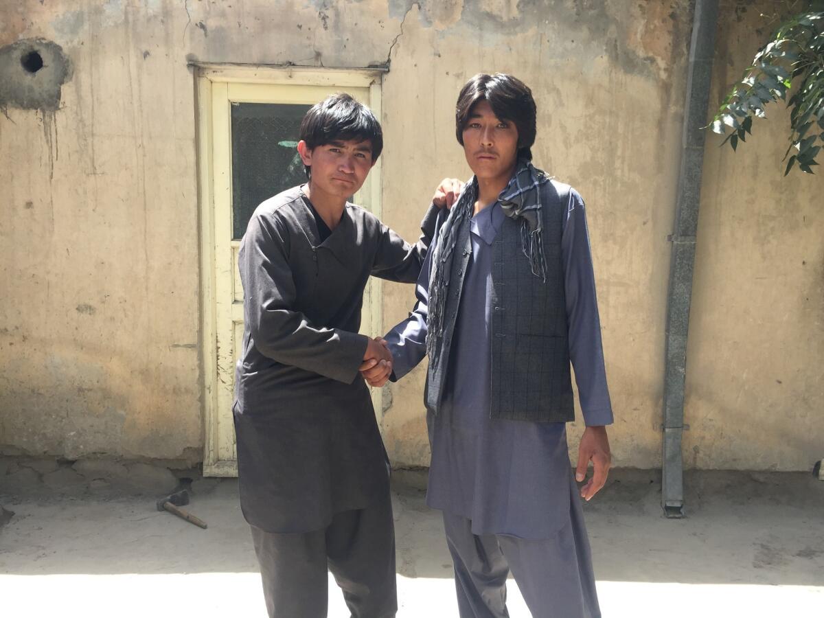 Ibrahim, left, and Ali, two members of the Afghan Local Police, seen in Kabul, Afghanistan, on Sunday.
