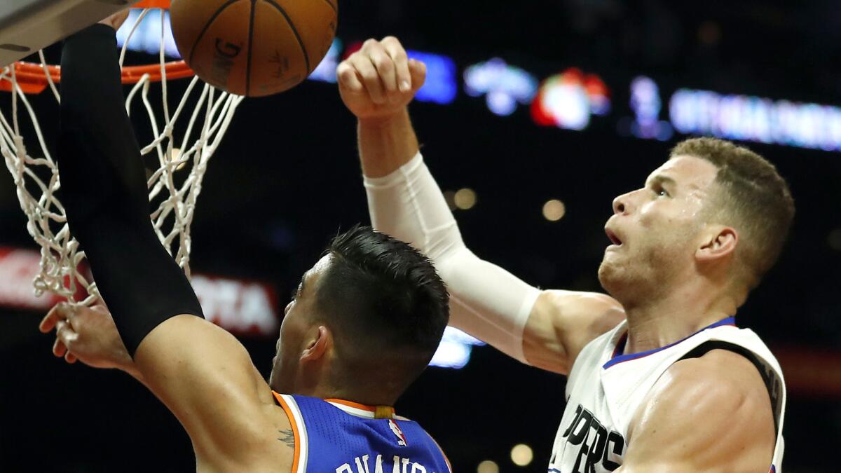 Clippers forward Blake Griffin blocks a shot by Knicks center Willy Hernangomez during the second half of Monday's game.