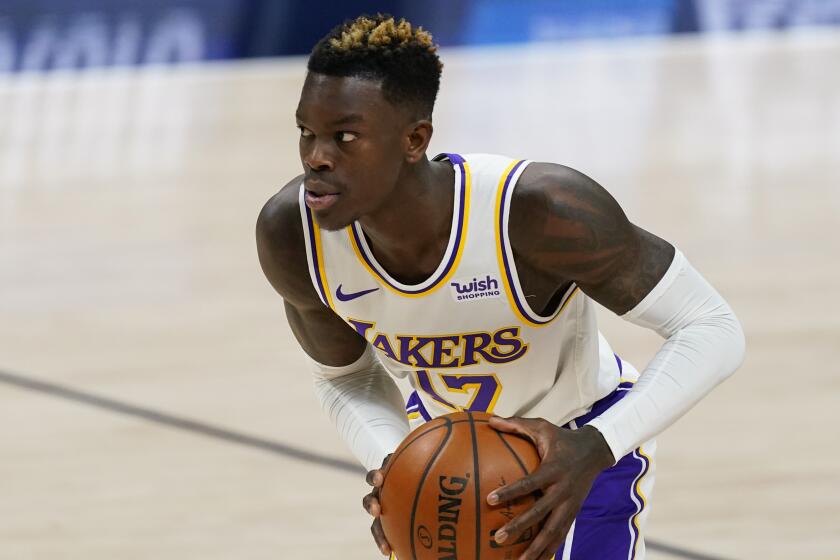 Lakers guard Dennis Schroder in action against the Nuggets.