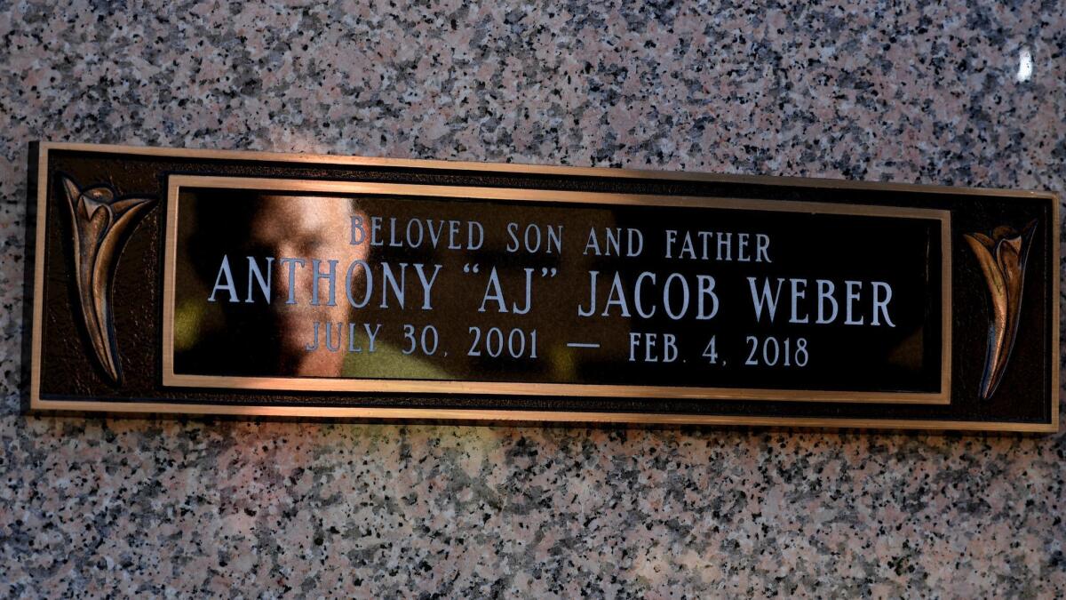 John Weber observes the marker for his son, Anthony, at the Inglewood Cemetary. “They need to give us more support,” he says.