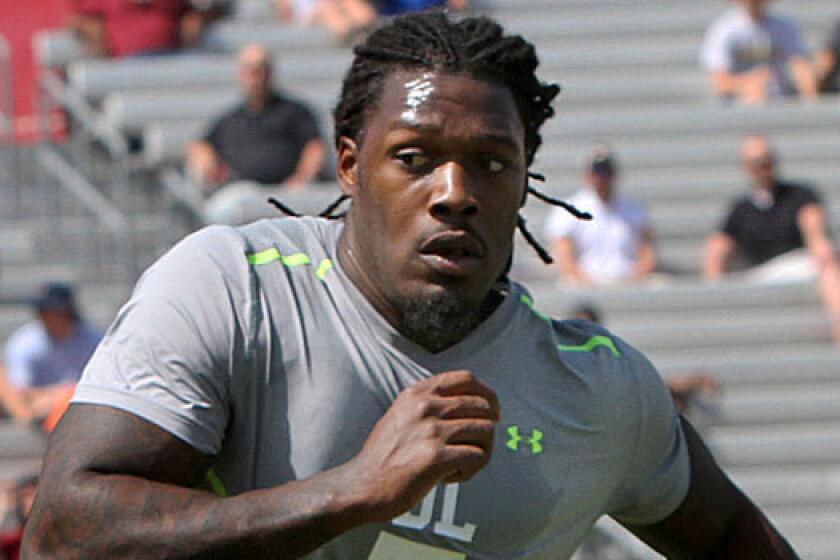 South Carolina defensive end Jadeveon Clowney goes through a drill for NFL representatives at the university's football pro day on April 2.