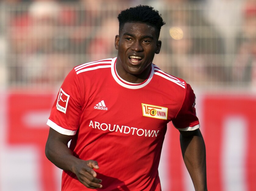 FILE - Union's Taiwo Awoniyi plays the ball during the German Bundesliga soccer match between 1. FC Union Berlin and FC Bayern Munich in Berlin, Germany, Oct. 30, 2021. Nottingham Forest has signed Awoniyi after paying a club-record transfer fee to Union Berlin, making the Nigerian its first international signing since returning to the Premier League. The 24-year-old Awoniyi signed a five-year contract after Forest paid the Bundesliga club a fee reported to be around 17 million pounds ($21 million) it was announced Saturday, June 25, 2022. (AP Photo/Michael Sohn, file)