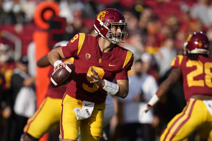 Southern California quarterback Kedon Slovis (9) looks to throw.