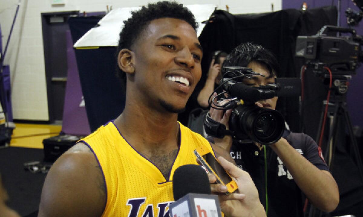 Guard Nick Young, who signed with the Lakers in July after playing last season at Philadelphia, could sit out the Lakers' first two preseason games.