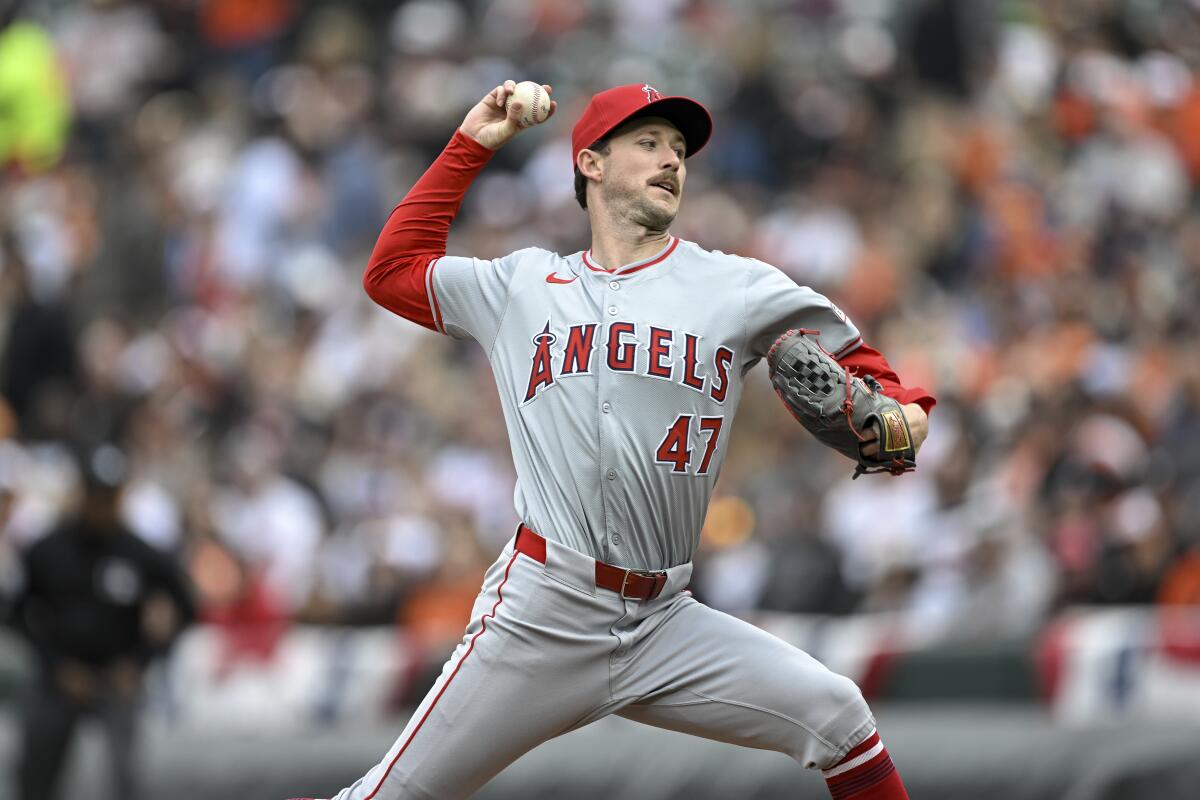 Angels starting pitcher Griffin Canning delivers during a 13-4 loss to the Baltimore Orioles on Saturday. 