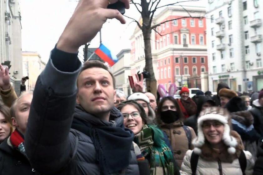 TOPSHOT - A still image taken from an AFPTV footage shows opposition leader Alexei Navalny taking a selfie photograph during a rally calling for a boycott of March 18 presidential elections, Moscow, January 28, 2018. / AFP PHOTO / Alexandra DalsbaekALEXANDRA DALSBAEK/AFP/Getty Images ** OUTS - ELSENT, FPG, CM - OUTS * NM, PH, VA if sourced by CT, LA or MoD **