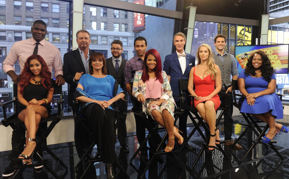 The upcoming "Dancing with the Stars cast on "Good Morning America": From left, NFL wide receiver Keyshawn Johnson, comic Bill Engvall, TV personality Jack Osbourne, actor Corbin Bleu, Bill Nye the "Science Guy," actor Brant Daugherty, and seated from left, TV personality Nicole "Snooki" Polizzi, actress Valerie Harper, singer-actress Christina Milian, actress Elizabeth Berkley Lauren and actress Amber Riley. Actress Leah Remini will also be a contestant.