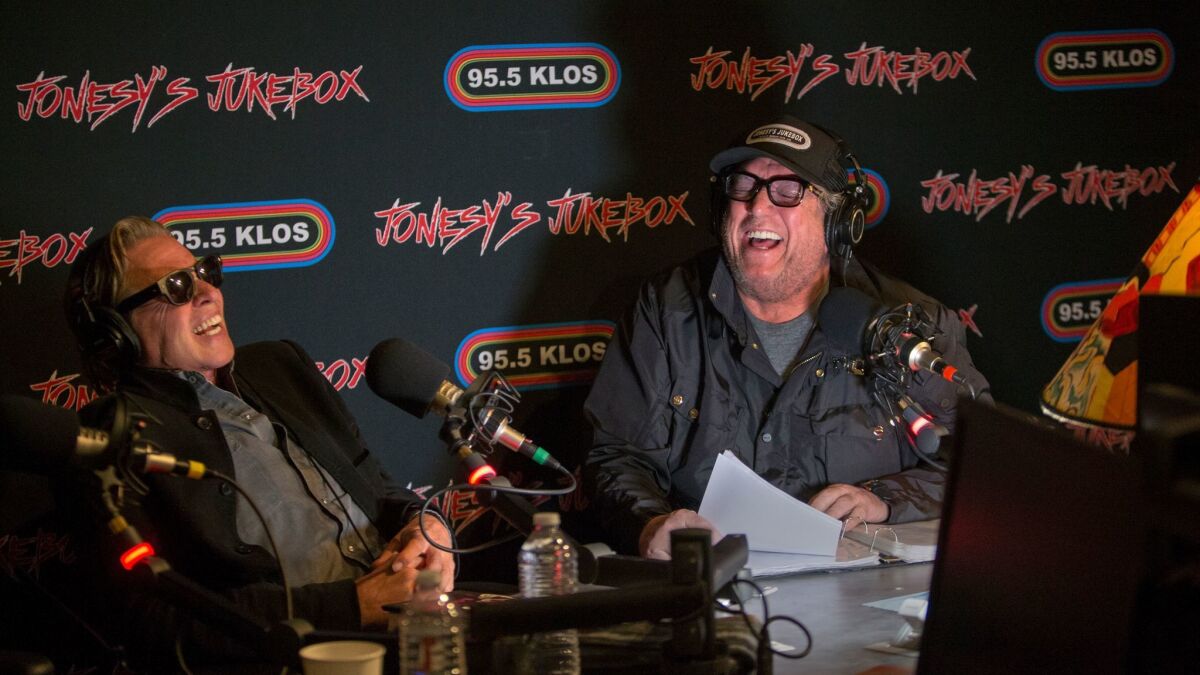 Steve Jones, right, at his show Jonesy's Jukebox on KLOS with guest Val Kilmer.