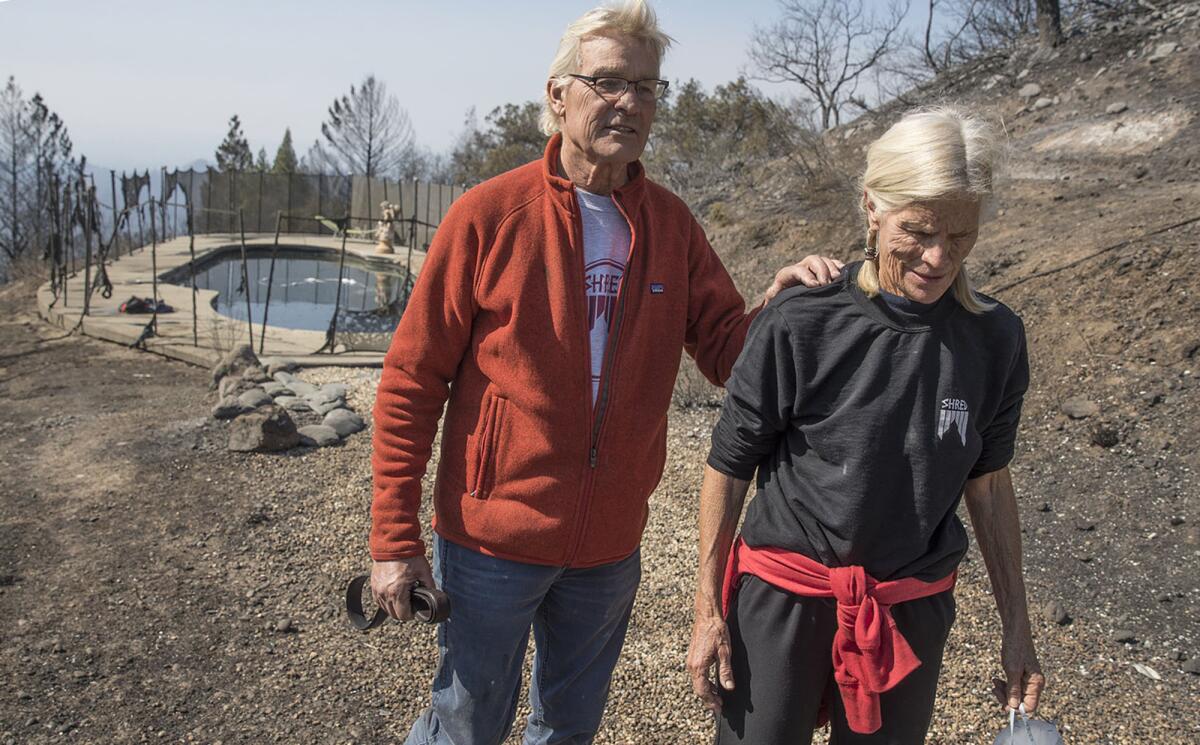 John and Jan Pascoe survived the firestorm Monday morning by running out of their home and into their neighbors swimming pool in Santa Rosa.