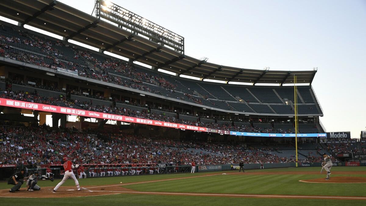 Angels designated hitter Shohei Ohtani hits a single against the Seattle Mariners on June 8. If the team chooses to renovate Angel Stadium, the city of Anaheim isn't expected to offer part of its general fund to cover costs.