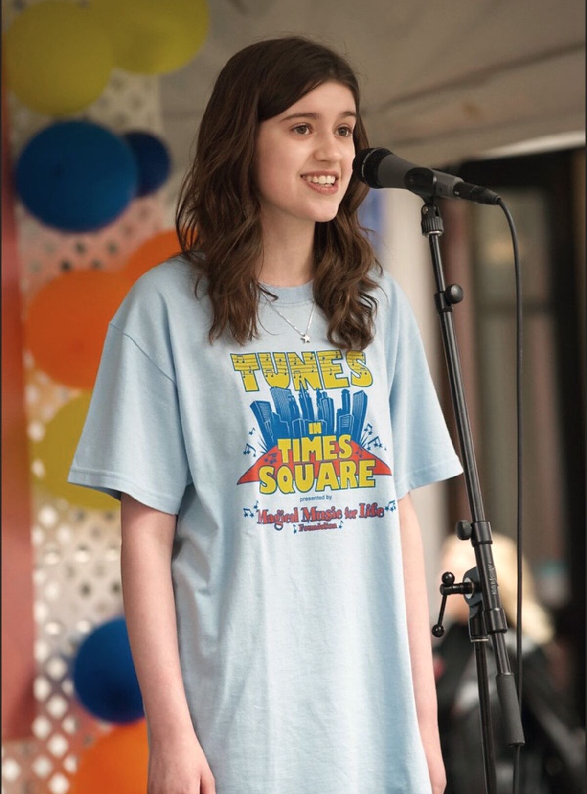 La Cañada resident Gracie Dundee, freshman at the Academy at Laurel Springs School, an online private school, is an accomplished vocalist and performer who made her Carnegie Hall solo debut last December and will soon attend Juilliard School's prestigious summer program. Above, she performs and volunteers for the Tunes in Times Square fundraiser.