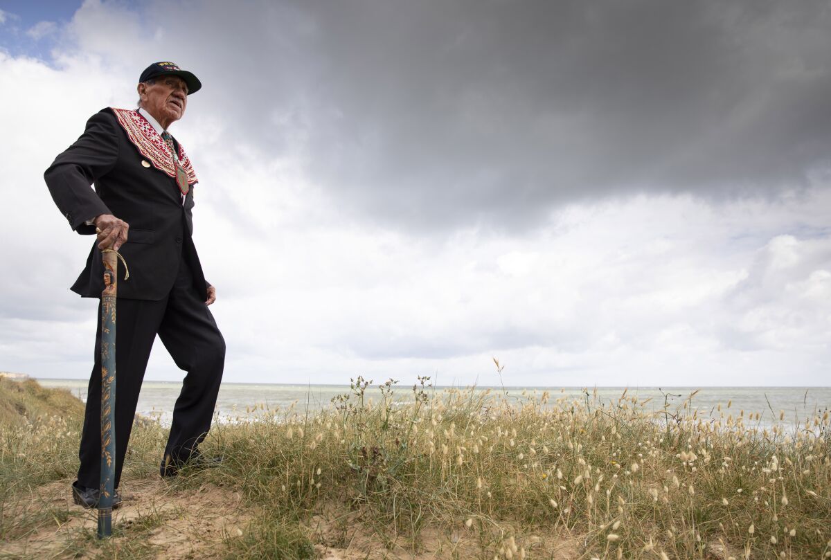 World War II D-day veteran Charles Shay on a dune overlooking Omaha Beach.