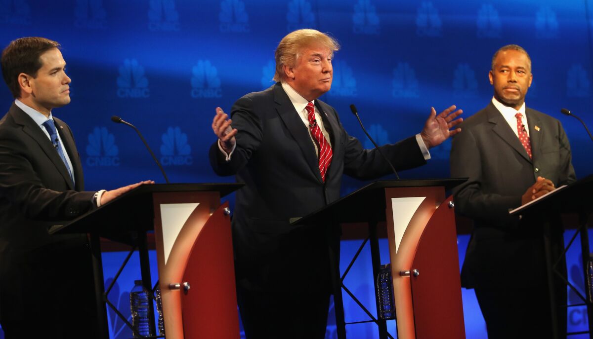 Sen. Marco Rubio (R-Fla.), left, Donald Trump and Ben Carson onstage at the CNBC Republican presidential debate Oct. 28, 2015, in Boulder, Colo.