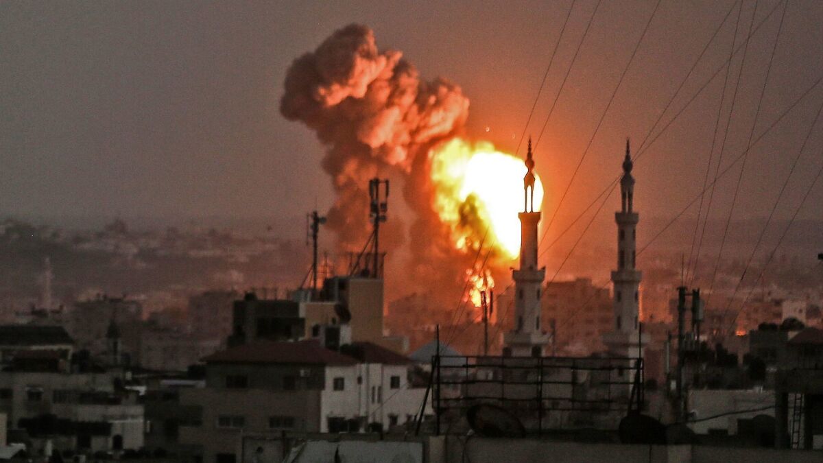 A fireball explodes in Gaza City during bombardment by Israeli forces on July 20, 2018.