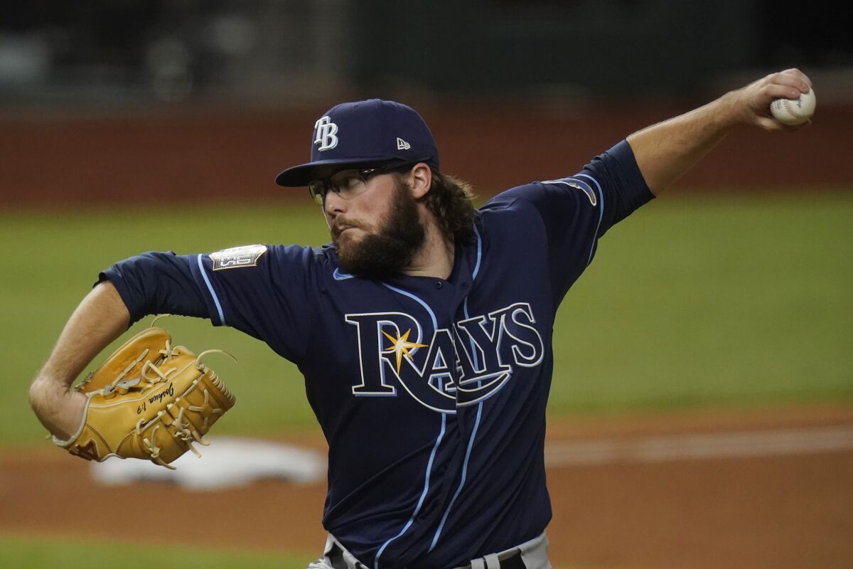 Tampa Bay Rays relief pitcher Josh Fleming throws against the Dodgers in the seventh inning.
